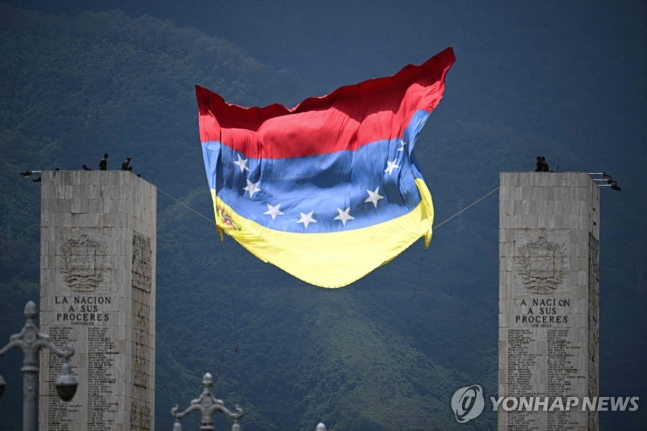 바람에 흔들리는 베네수엘라 국기
[AFP 연합뉴스 자료사진. 재판매 및 DB 금지]