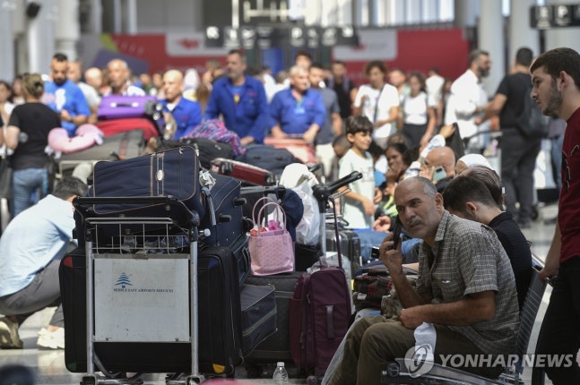 Passengers waiting for delayed flights to depart at Beirut International Airport
[EPA News Agency. Distribution and DB Prohibited]
