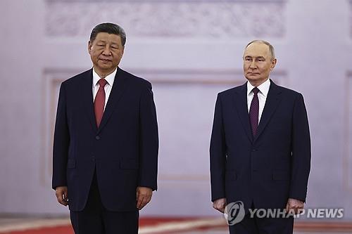 시진핑 중국 국가주석(왼쪽)과 블라디미르 푸틴 러시아 대통령 [AP 연합뉴스 자료사진.재판매 및 DB 금지]