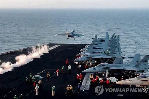 미 항공모함에서 이륙하는 전투기
[AFP 연합뉴스 자료사진. 재판매 및 DB 금지]