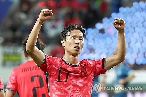 Eom Ji-sung of South Korea celebrates after scoring a goal against Paraguay during the teams' friend