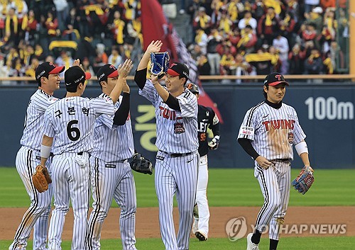 LG Twins players celebrate their 8-2 win over the Hanwha Eagles in Game 1 of the Korean Series at Ja