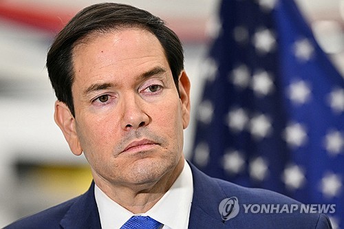 This photo, released by Reuters, shows U.S. Secretary of State Marco Rubio speaking to journalists a
