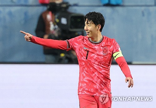 Son Heung-min of South Korea celebrates after scoring a goal against Bolivia during the teams' frien