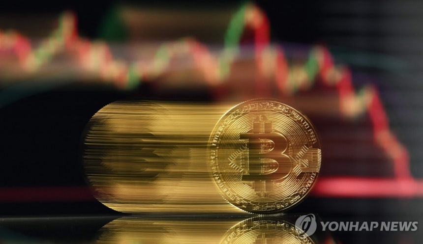 비트코인 상징물 [AFP 연합뉴스 자료사진.재판매 및 DB 금지]