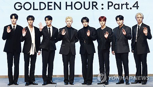 The members of K-pop boy band Ateez pose for photos at a press conference for the band's 13th EP, "G