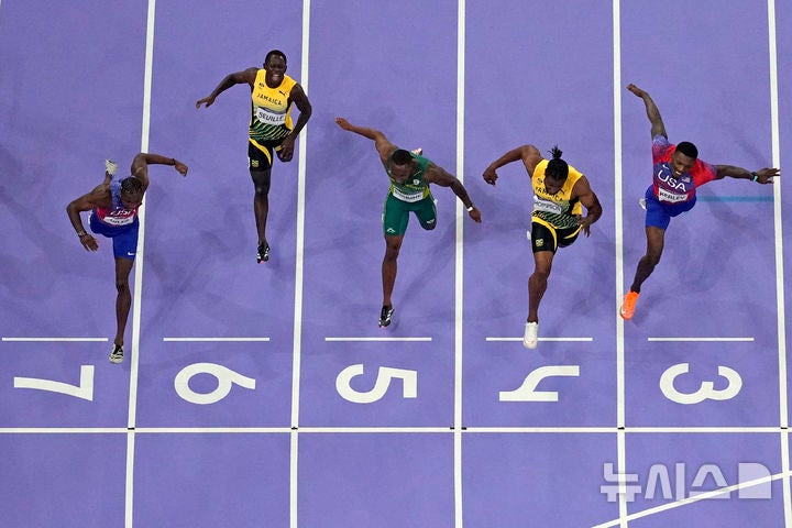 육상 <b>100m 노아</b> 라일스, 0.005초 차이로 <b>금메달</b> [뉴시스Pic]