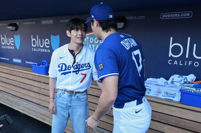 V threw out the first pitch at a home game of the LA Dodgers in Major League Baseball.