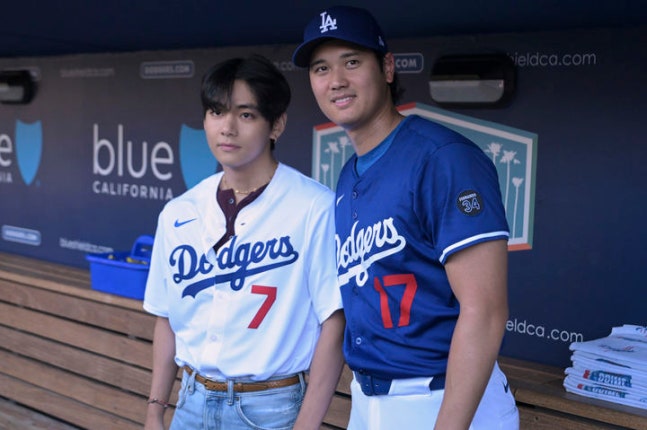 V threw out the first pitch at a home game of the LA Dodgers in Major League Baseball.