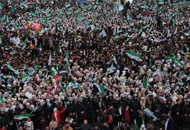 [Damascus=AP/Newsis] On the 8th (local time), Syrian citizens attend an event in the capital Damascus to commemorate the first anniversary of the ousting of the Assad dictatorship. December 14, 2025.