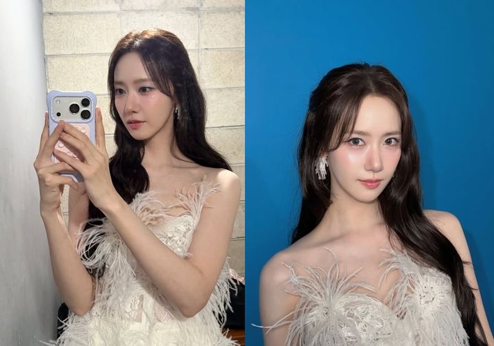 羽根飾りをあしらった白いドレス姿で鏡越しの写真を撮る少女時代ユナ