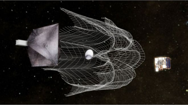 우주쓰레기 수거를 위한 실험용 청소 위성이 2018년 4월 2일 스페이스X 로켓에 탑재돼 발사됐다고 영국 BBC 방송이 전했다. 사진은 청소 위성이 우주쓰레기를 수거하는 상상도. 영국 BBC 캡처