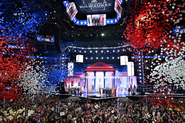 On the last day of the Republican National Convention held at the Pyser Pavilion in Milwaukee, Wisconsin on the 18th local time, former President Donald Trump concludes his acceptance speech as a presidential candidate and red, white, and blue balloons float over the convention center. AFP via Reuters