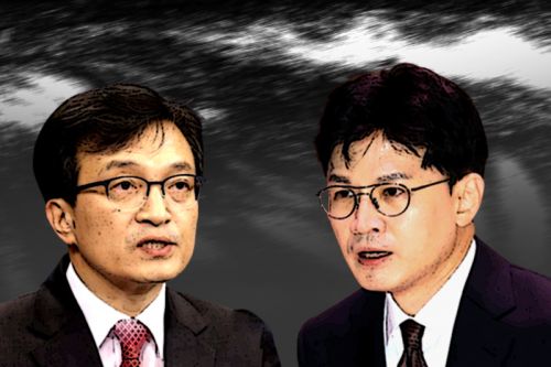 Kim Eui-kyum former Democratic Party lawmaker and Han Dong-hoon leader of the People Power Party. Photo from the Kukmin Ilbo