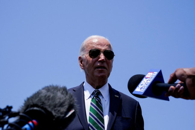 U.S. President Joe Biden speaks to the press as he arrives at Louis Armstrong New Orleans International Airport in Kenner, Louisiana, U.S. August 13, 2024.