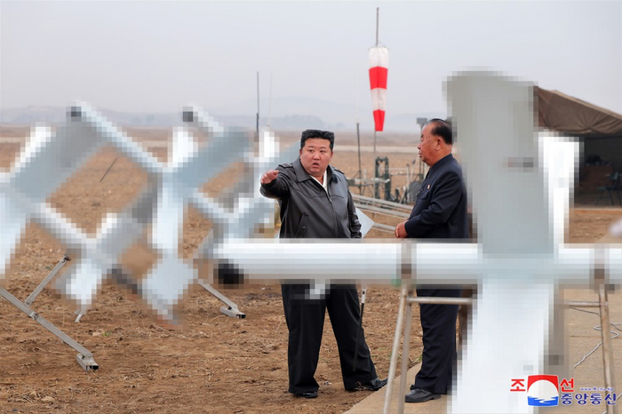 North Korean leader Kim Jong-un guided the performance tests of various suicide attack drones produced by institutes and enterprises under the UAV Technology Consortium on the 14th, as reported by Korean Central News Agency on the 15th. [KCNA·Yonhap News]