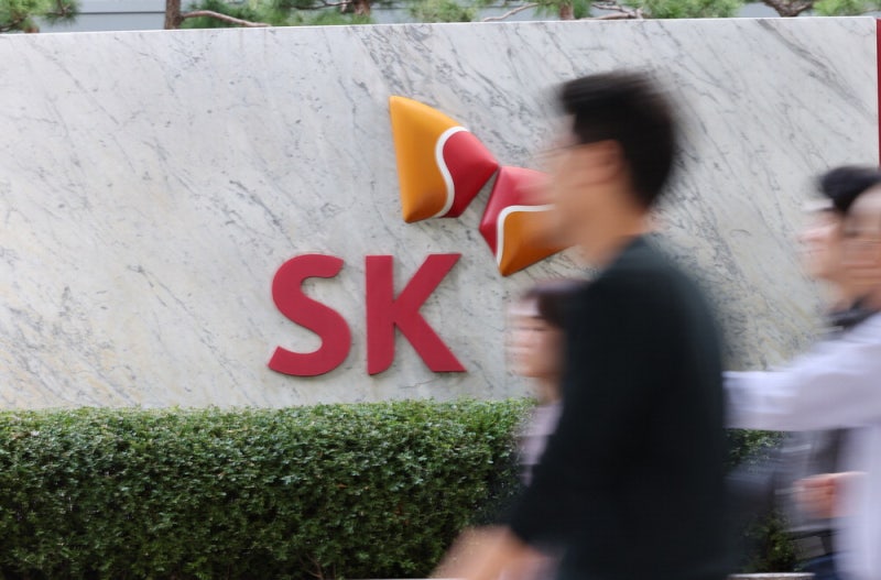 한숨 돌린 SK … 배당 기대 꺾여 주가는 '뚝'