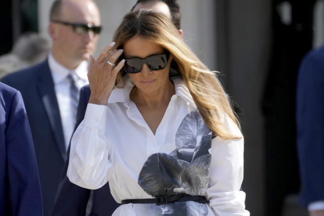 FILE - Former first lady Melania Trump leaves after voting in the Florida primary election in Palm Beach, Fla., March 19