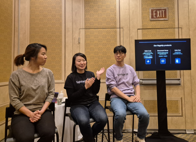 Noh Kyung-sil (from left), Head of Upstage's US Business, Park Eun-jung, Upstage's Chief Product Officer (CPO), and Lee Hwal-seok, Upstage's Chief Technology Officer (CTO), at the AWS annual tech conference held at The Venetian in Las Vegas on the 4th.