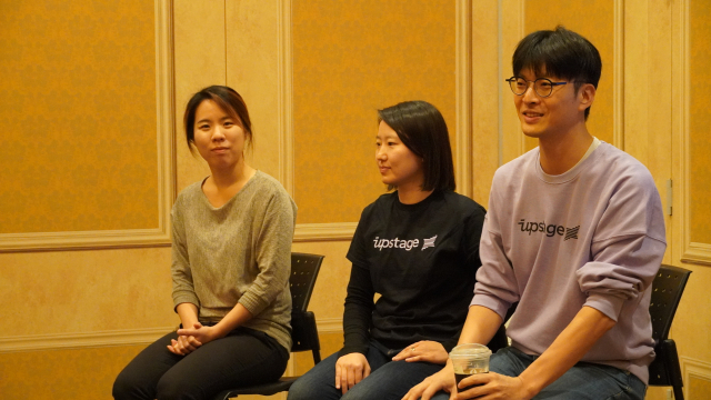 Noh Kyung-sil (from left), Head of Upstage's US Business, Park Eun-jung, Upstage's Chief Product Officer (CPO), and Lee Hwal-seok, Upstage's Chief Technology Officer (CTO), presenting the new LLM 'Solar Pro' at the AWS re:Invent held at The Venetian, Las Vegas.