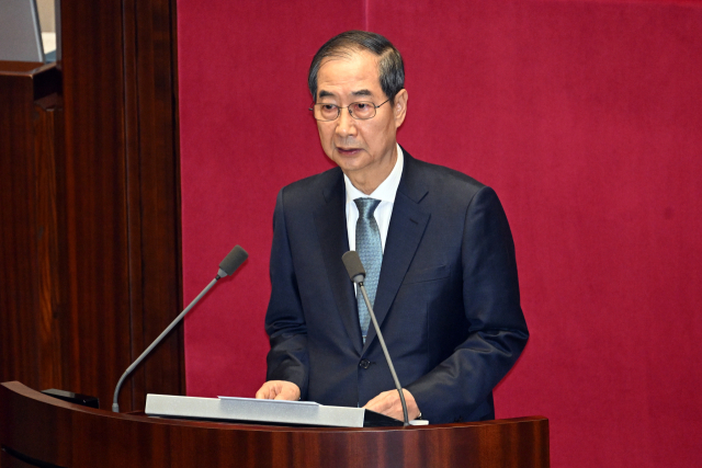 한덕수 대통령 권한대행 국무총리가 지난 24일 서울 여의도 국회 본회의장에서 추가경정예산안 시정연설을 하고 있다. 연합뉴스