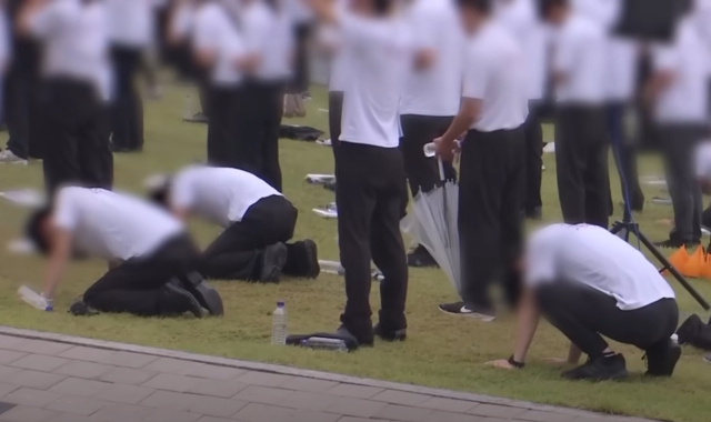 지난 7월 18일 민중기 특검팀의 통일교 시설 압수수색에 반발해 통일교 천정궁 앞에 모인 신도들. MBC 보도화면 캡처