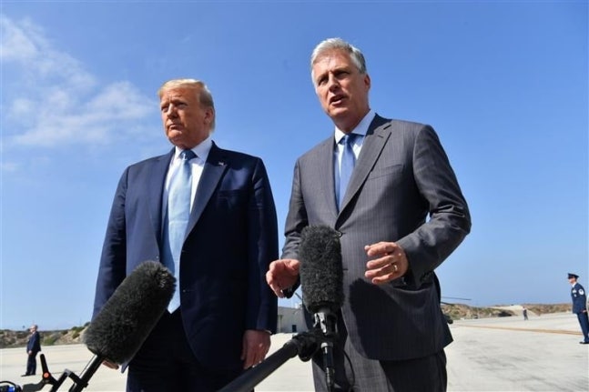 Former U.S. President Donald Trump (left), former National Security Adviser Robert O'Brien. / Photo=AFP