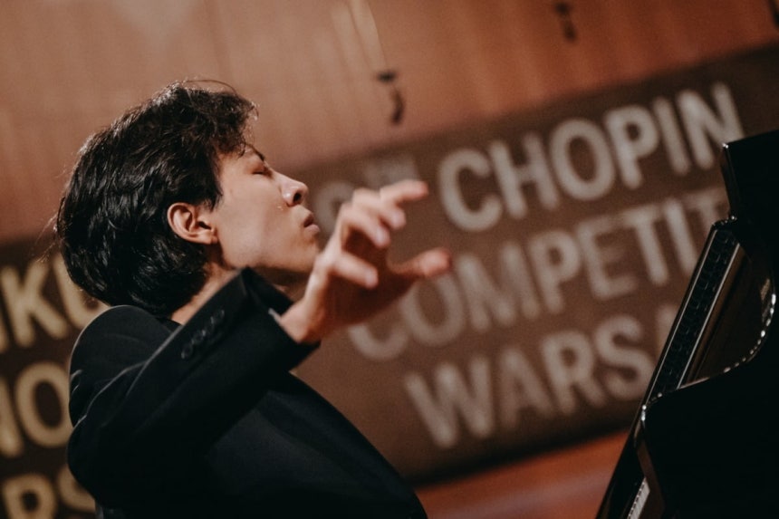 Pianist Lee Hyuk performing on stage during the 2nd round of the 19th International Chopin Piano Competition. Photo courtesy of the Chopin Competition Committee.
