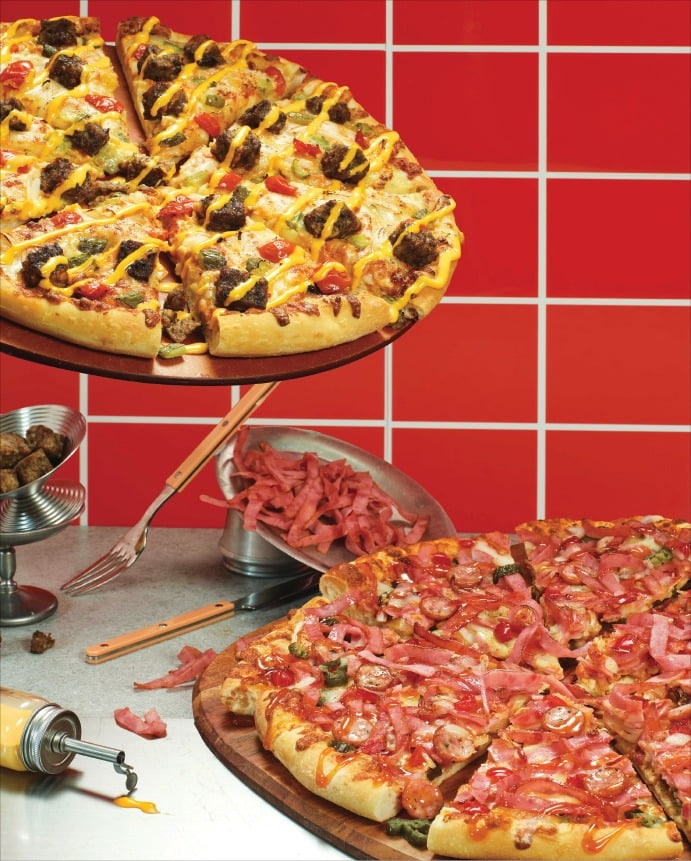 도미노피자, 달  콤짭짤한 치즈에 불향 가득 패티…미국 본토 맛 '아메리칸 클래식 피자'