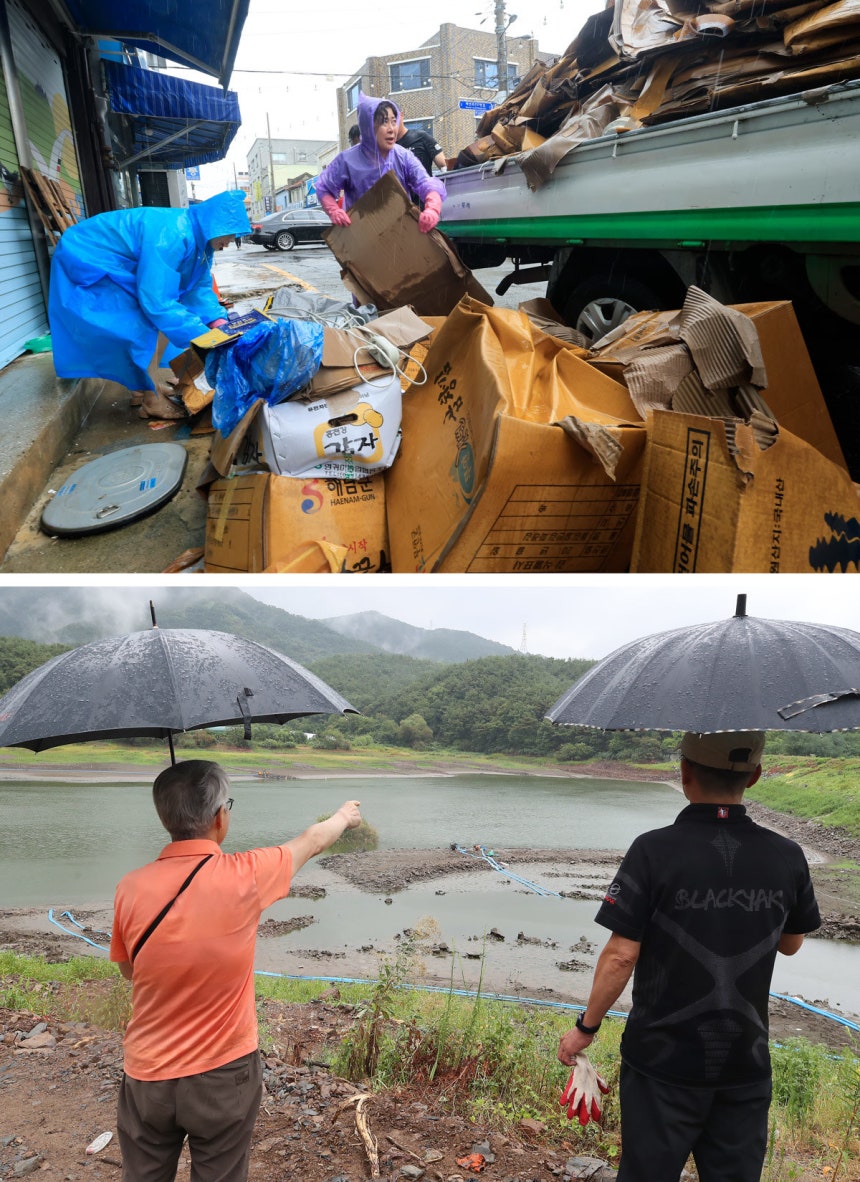 가뭄 끝낼‘단비’기다렸는데… 곳곳 침수 피해 새벽에 기습 폭우가 내린 16일 전남광주 목포시 만호동 일대 건어물 상가에서 주민과 공무원이 물에 잠긴 미역과 멸치,<a href=
