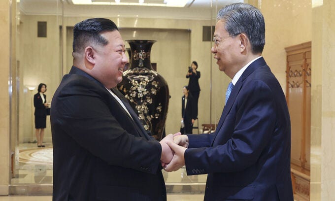 <b>김정은</b>, <b>자오러지</b> 면담··· 시진핑 방북 논의했나