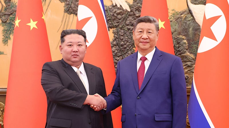 김정은·시진핑 “北中은 <b>운명 공동체</b>”