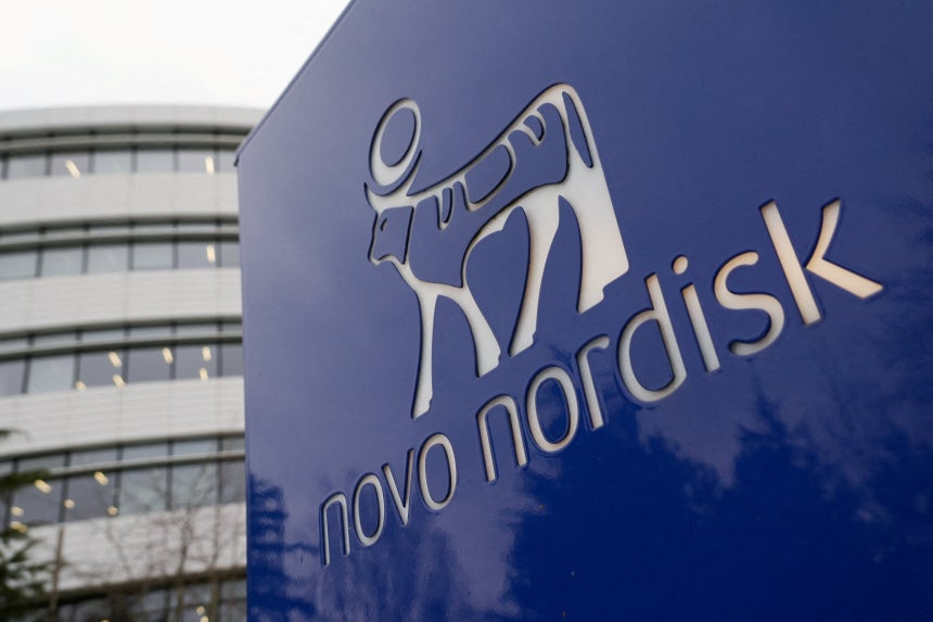  FILE PHOTO: The logo of pharmaceutical company Novo Nordisk is displayed in front of its offices in Bagsvaerd,Copenhag