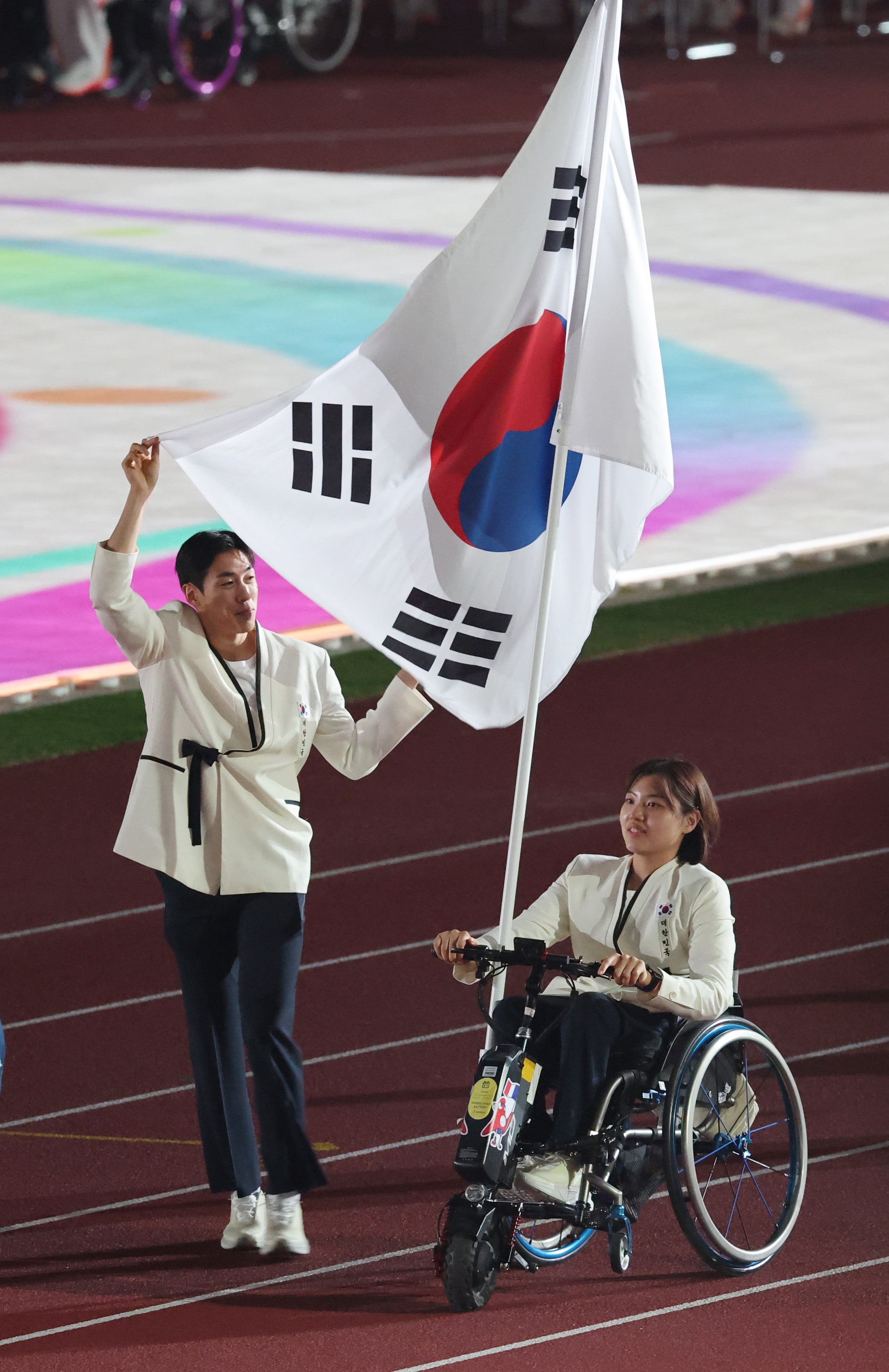 나고야 달군 태극기, 윤지유·장민호 손잡고 장애인 아시안게임 출격