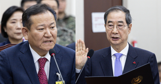 이상민 전 행정안전부 장관(왼쪽)과 한덕수 국무총리가 2025년 1월 22일 서울 여의도 국회에서 열린 윤석열 정부의 비상계엄 선포를 통한 내란 혐의 진상규명 국정조사 1차 청문회에 출석했다.뉴스1