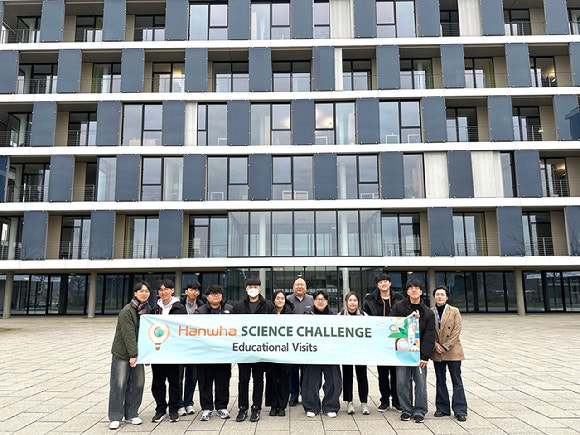 Hanwha Science Challenge winners taking a photo in front of the Q CELLS R&D center.