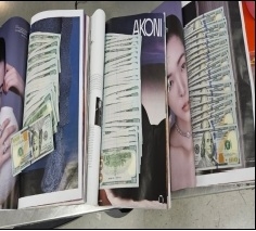 지난 11월 24일 잡지에 100달러짜리 25만달러를 숨겨 밀반출하려던 남성이 인천공항 보안검색에서 적발됐다. 인천국제공항공사 제공