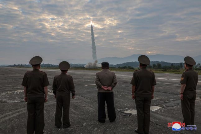 North Korean leader Kim Jong Un observing missile launch training. / Chosun Central News = Yonhap News