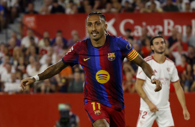 Soccer Football - LaLiga - Sevilla v FC Barcelona - Estadio Ramon Sanchez Pizjuan, Seville, Spain - September 19, 2026 FC Barcelona's Raphinha celebrates scoring their second goal REUTERS/Marcelo Del Pozo