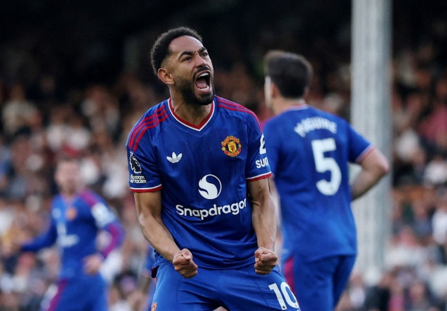 Soccer Football - Premier League - Fulham v Manchester United - Craven Cottage, London, Britain - September 20, 2026 Manchester United's Matheus Cunha celebrates scoring their first goal REUTERS/Toby Melville EDITORIAL USE ONLY. NO USE WITH UNAUTHORIZED AUDIO, VIDEO, DATA, FIXTURE LISTS, CLUB/LEAGUE