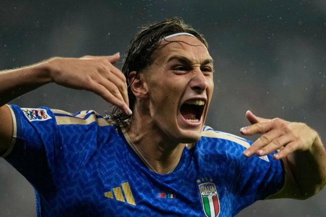 Italy's Pio Esposito celebrates after scoring his side's fourth goal during the UEFA Nations League soccer match between Turkey and Italy in Bursa, Turkey, Monday, Sept. 28, 2026. (AP Photo/Khalil Hamra)
