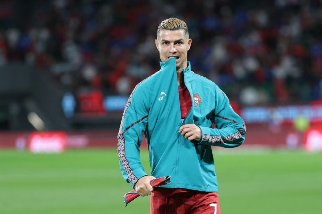 (FILES) Portugal's forward #07 Cristiano Ronaldo gestures ahead of the UEFA Nations League league phase group A4 football match between Portugal and Wales at Jose Alvalade stadium in Lisbon on September 24, 2026. Cristiano Ronaldo opens door for Portugal return, apologises for walk-out, AFP reports