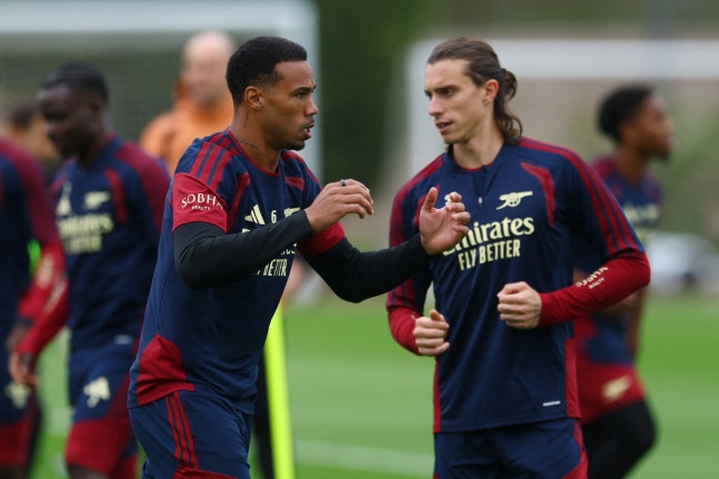Soccer Football - UEFA Champions League - Arsenal Training - Arsenal Training Centre, London Colney, Britain - October 12, 2026 Arsenal's Gabriel Magalhaes and Riccardo Calafiori during training Action Images via Reuters/Matthew Childs