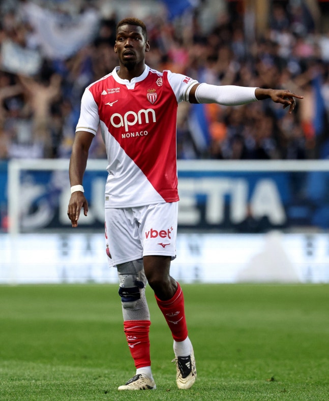 (FILES) Monaco's French midfielder #08 Paul Pogba gestures during the French L1 football match between Paris FC and AS Monaco at the Stade Jean-Bouin in Paris on April 10, 2026. Former Manchester United and Juventus midfielder Paul Pogba will be released by Monaco after a series of injuries, the Fre