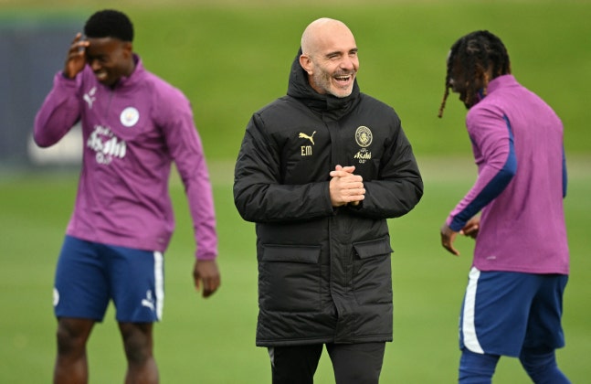 Manchester City's Italian manager Enzo Maresca (C) reacts as he takes a training session at the Etihad Campus training ground in Manchester, north-west England, on October 13, 2026, on the eve of their UEFA Champions League, league phase football match against PSG. (Photo by Oli SCARFF / AFP)