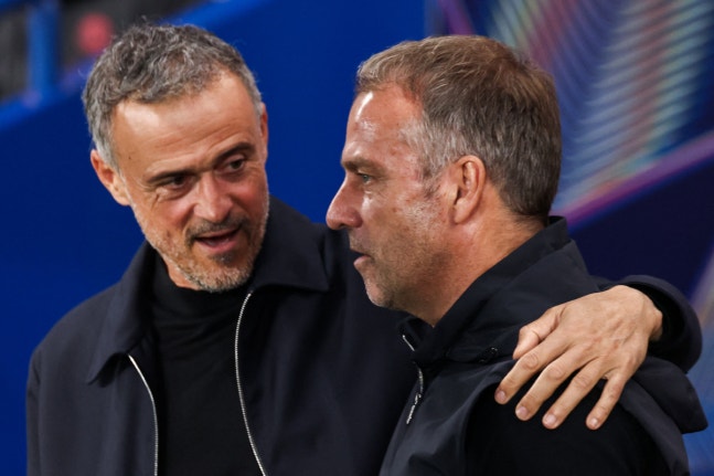 PSG's Spanish headcoach Luis Enrique greets Barcelona's German coach Hans-Dieter Flick ahead of the UEFA Champions League first round day 3 football match between Paris Saint-Germain (PSG) and FC Barcelona at the Parc de Princes stadium in Paris on October 20, 2026. (Photo by FRANCK FIFE / AFP)