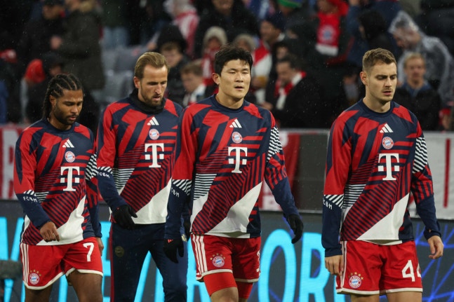 (L-R) Bayern Munich's German forward #07 Serge Gnabry, Bayern Munich's English forward #09 Harry Kane, Bayern Munich's South Korean defender #03 KimaMin-Jae and Bayern Munich's Croatian defender #44 Josip Stanisic come out to warm up prior to the UEFA Champions League football match between FC Bayer
