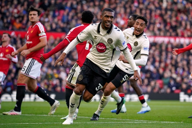 Bournemouth's Rayan celebrates scoring his side's first goal during the English Premier League soccer match between Manchester United and Bournemouth in Manchester, England, Sunday, Oct. 25, 2026. (AP Photo/Dave Thompson)
