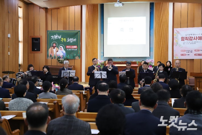 아이노스 관악단의 축가.김일현 선교국장