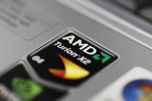 AMD, competing with NVIDIA to enhance AI capabilities, announced on the 19th that it will acquire server manufacturing company ZT Systems for $4.9 billion (approximately 6.5 trillion won) in cash and stock. Photo shows a computer with the AMD logo displayed.